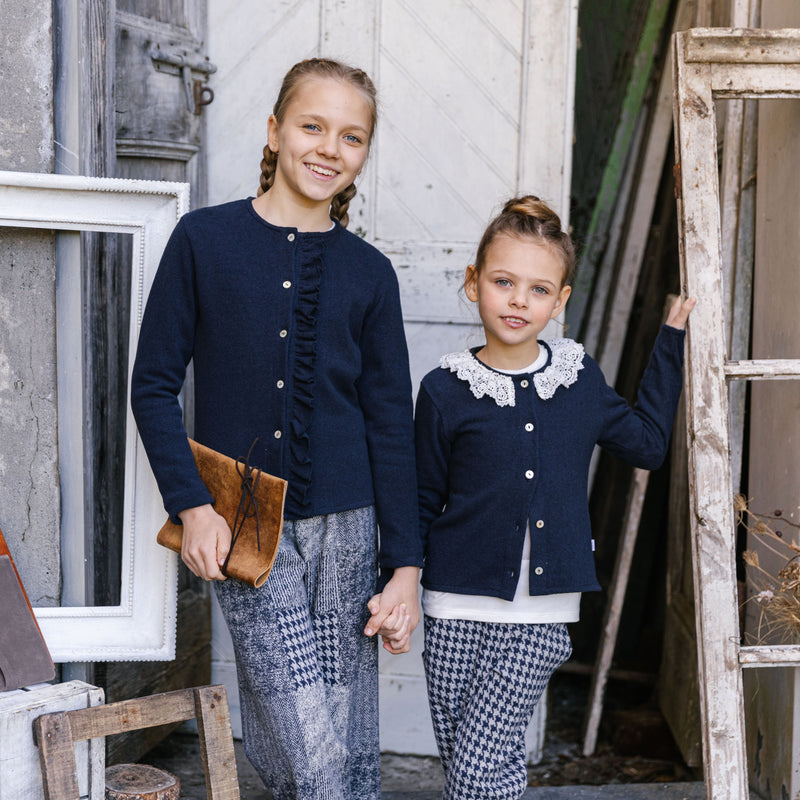 CARDIGAN CON ROUCHES VERTICALE