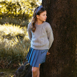 MAGLIONE CON TRECCE