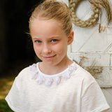 T-SHIRT CROPPED CON FRANGIA