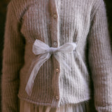 Beige cardigan with tulle bow