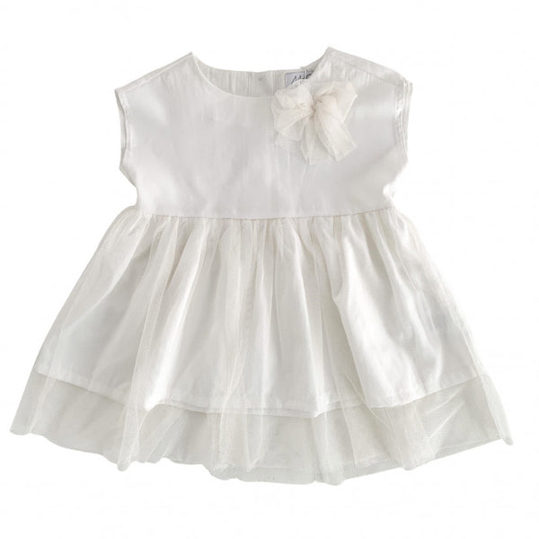 White peachskin top with tulle flounce