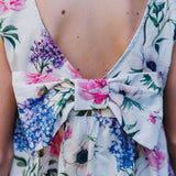 FLORAL PATTERNED DRESS WITH BOW ON THE BACK