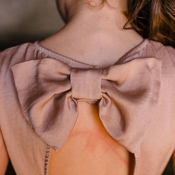 Handsilk cut out top with bow