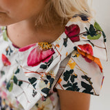 PRINTED COTTON DRESS WITH BOW BROOCH